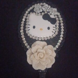 Hello Kitty Hand Mirror with Floral Design